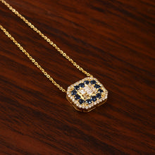 Load image into Gallery viewer, 14K YELLOW GOLD, DIAMOND & BAGUETTE AND BLUE SAPPHIRE CHAIN PENDANT