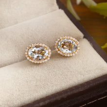Load image into Gallery viewer, 0.15 CT DIAMOND & 1.40 CT AQUAMARINE 14K YELLOW GOLD STUDS