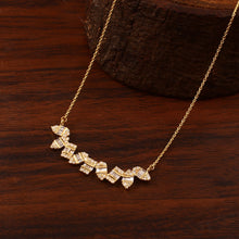 Load image into Gallery viewer, DIAMOND AND DIAMOND BAGUETTE & 14K YELLOW GOLD NECKLACE