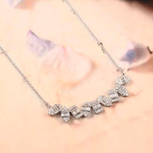 Load image into Gallery viewer, DIAMOND AND DIAMOND BAGUETTE & 14K WHITE GOLD NECKLACE