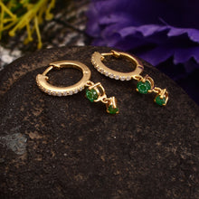 Load image into Gallery viewer, 0.20 CT DIAMOND & 14K YELLOW GOLD WITH EMERALD HUGGIE HOOP EARRING