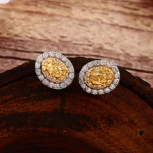 Load image into Gallery viewer, 0.95 CT DIAMOND &amp; YELLOW OVAL SHAPE DIAMOND 14K WHITE YELLOW GOLD EARRING
